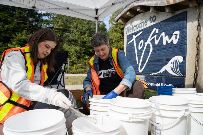 Picking up debris as part of an Earth Day clean-up effort